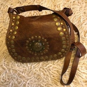 Gorgeous leather handbag with metal studs/design, by Patricia Nash; like new